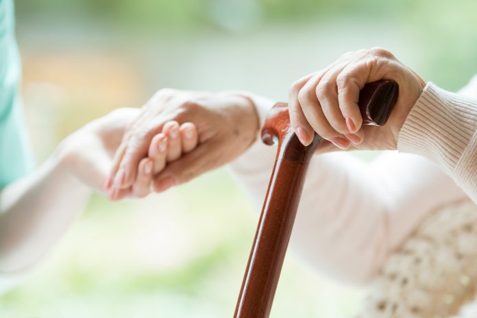 Elder person supported on stick WeCare to tackle care staffing shortage