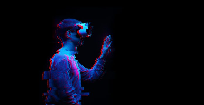 Man is using virtual reality headset. Image with glitch effect.