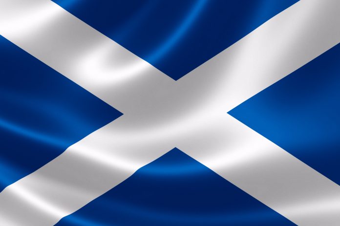 3D rendering of the flag of Scotland on satin texture.