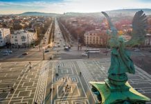 Why do Germans travel to Hungary for dental treatment?
