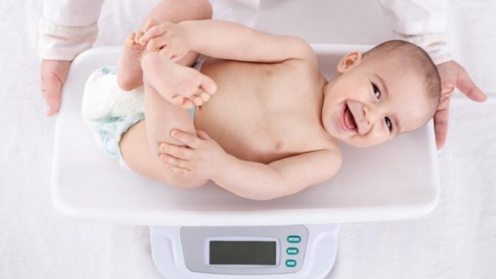 baby on scales