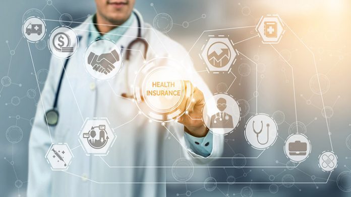 Health Insurance Concept - Doctor in hospital with health insurance related icon graphic interface showing healthcare people, money planning, risk management, medical treatment and coverage benefit.