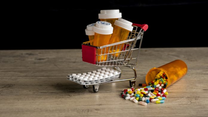 Shopping trolley filled with prescription medication