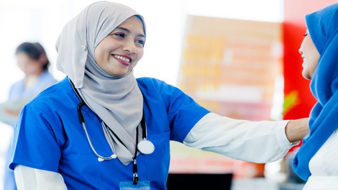 Gynecology consultation. A female Doctor giving advice to the pregnant woman in medical clinic