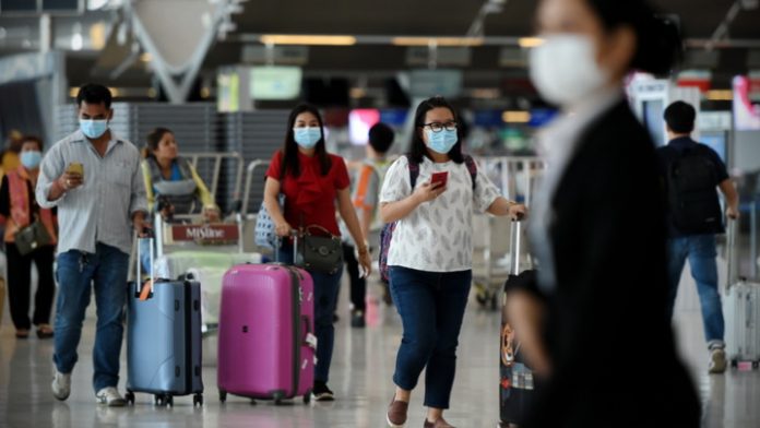 Coronavirus-safe travel-travellers at airport