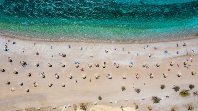 Coronavirus-travel-socially distanced beach