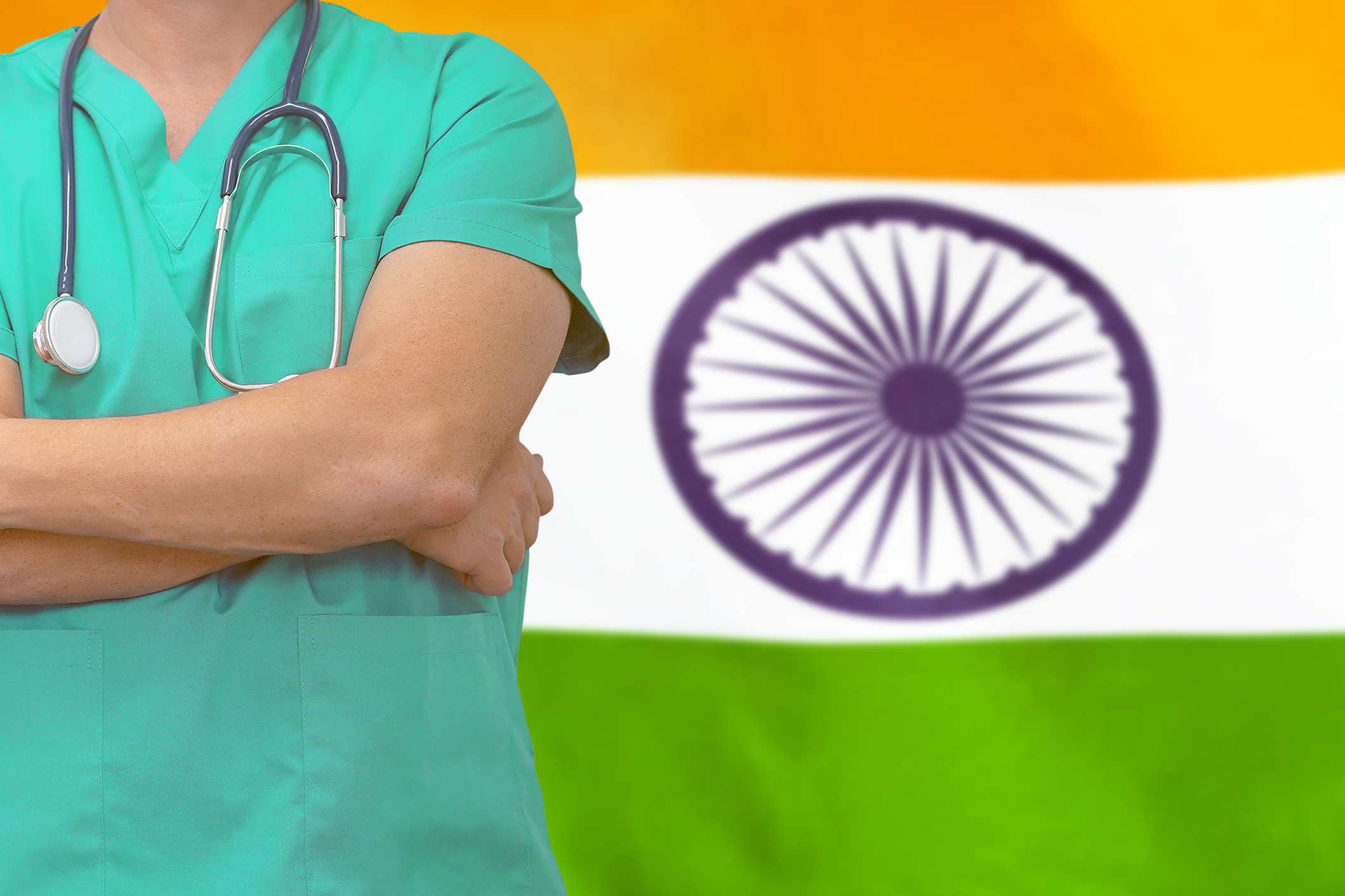 Man surgeon or doctor with stethoscope on the background of the India flag.  Health care, surgery and medical concept in India. - LaingBuisson News