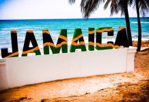 Jamaica: stalled on medical tourism Decorative sign saying 'Jamaica' on a beach