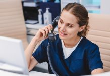 Could this work for medical travel? Young receptionist talking on the telephone