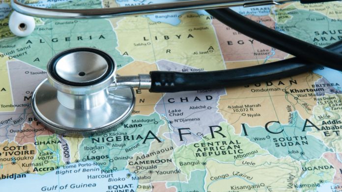 A stethoscope on top of a map of Africa