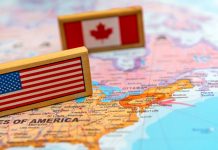 Canada opens borders to vaccinated US travellers America and Canada on a map.