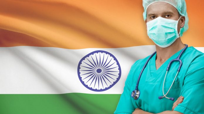 Surgeon in front of the Indian flag