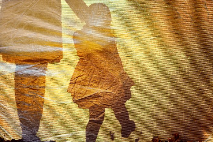 Shadow of a little girl and woman