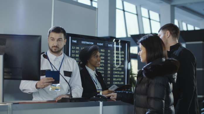 Airport passport checks_iStock-932263798 Stock image of airport passport checks, referencing European travel authorisation system