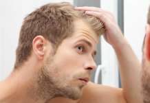 Growing the hair transplant sector Man looking at hair loss, referencing hair transplant sector