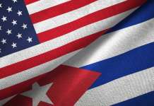 USA continues to ban medical travel to Cuba USA and Cuba flags, referencing USA and Cuba medical travel
