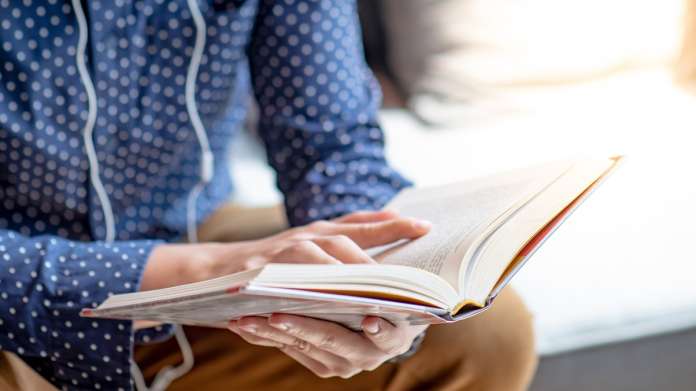 reading book_iStock-1128825419