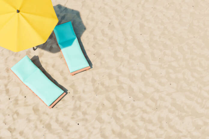 Loungers and parasols on beach