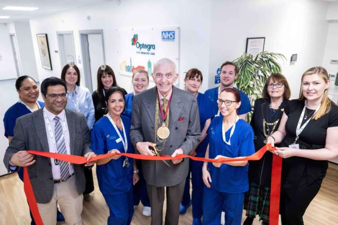 Optegra Colchester_Launch photo cutting the ribbon