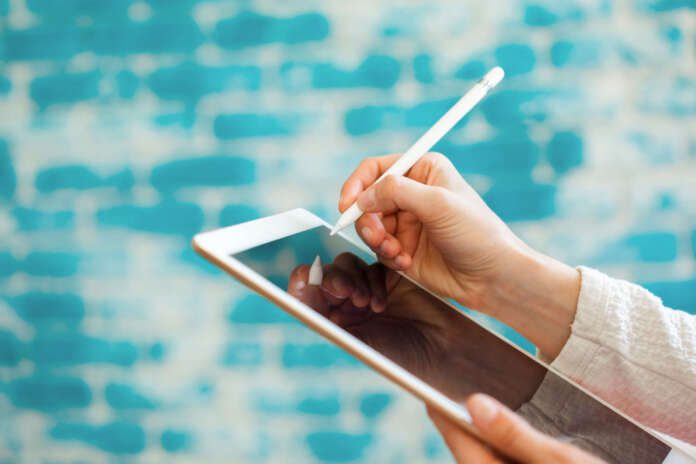 Woman Using Digital Tablet