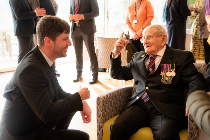 Anchor's Asa Johnson and WW2 veteran Eric who lives at Oakleigh care home