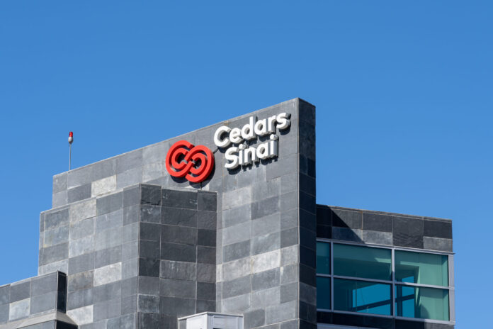 Los Angeles, CA, USA - July 7, 2022: Close up of Cedars Sinai logo on the building in Los Angeles, California, USA. Cedars-Sinai Medical Center is a nonprofit hospital and health science center.