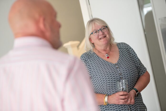 Prader-Willi Syndrome service in Brixham_Belinda Robinson, Director of Development at NCG, shows guests around the new service